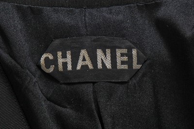 Lot 50 - A Chanel haute couture by Karl Lagerfeld black grosgrain ribbon suit and shoes, Spring-Summer 1991
