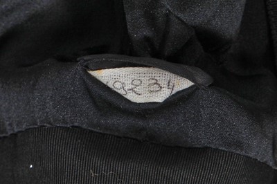 Lot 50 - A Chanel haute couture by Karl Lagerfeld black grosgrain ribbon suit and shoes, Spring-Summer 1991