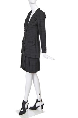 Lot 50 - A Chanel haute couture by Karl Lagerfeld black grosgrain ribbon suit and shoes, Spring-Summer 1991