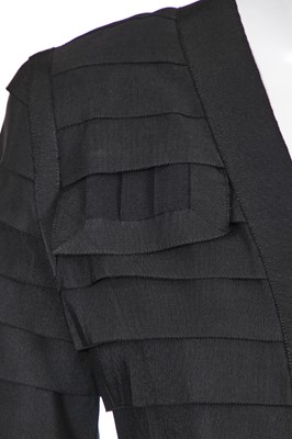 Lot 50 - A Chanel haute couture by Karl Lagerfeld black grosgrain ribbon suit and shoes, Spring-Summer 1991