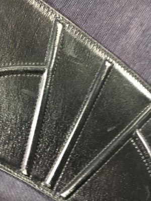 Lot 137 - An Azzedine Alaïa black polyester coat, 1990s