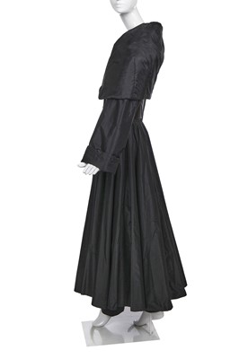 Lot 137 - An Azzedine Alaïa black polyester coat, 1990s