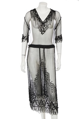 Lot 633 - A black beaded tulle tabard, circa 1915