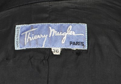 Lot 141 - A Thierry Mugler black cotton gaberdine and velvet suit, circa 1990