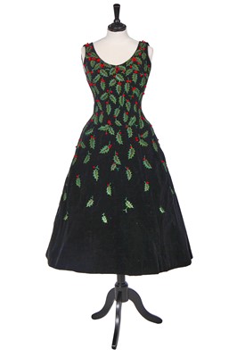 Lot 381 - A Pierre Balmain haute couture black velvet 'Holly' dress, 1955