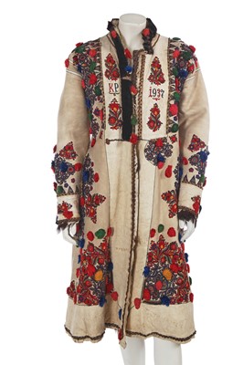 Lot 680 - A rare embroidered leather 'church' or wedding coat, Transylvania, Romania, 1937