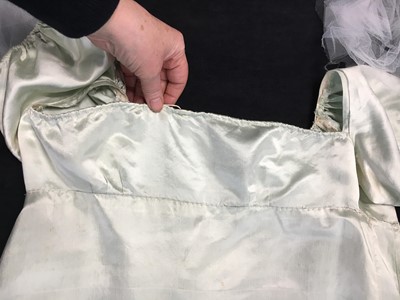Lot 62 - An eau de Nil satin evening dress, probably French, 1807-1809