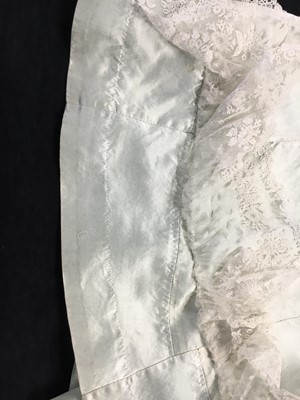 Lot 62 - An eau de Nil satin evening dress, probably French, 1807-1809