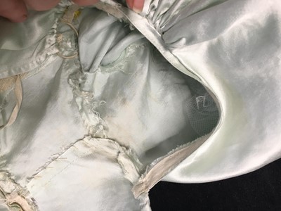Lot 62 - An eau de Nil satin evening dress, probably French, 1807-1809