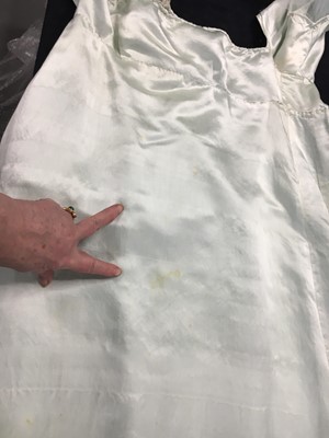 Lot 62 - An eau de Nil satin evening dress, probably French, 1807-1809