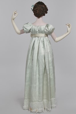 Lot 62 - An eau de Nil satin evening dress, probably French, 1807-1809