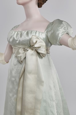 Lot 62 - An eau de Nil satin evening dress, probably French, 1807-1809