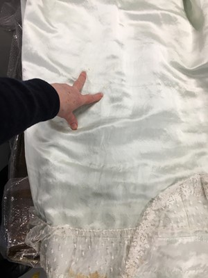 Lot 62 - An eau de Nil satin evening dress, probably French, 1807-1809