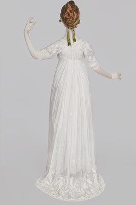 Lot 41 - A whitework embroidered muslin dress with trained hem, French, circa 1803