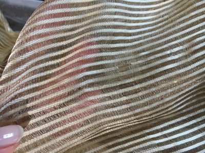 Lot 60 - A striped gold silk gauze ball gown, English, circa 1810