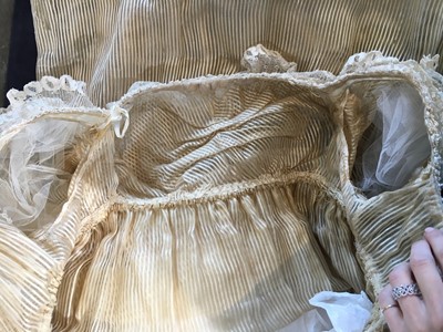 Lot 60 - A striped gold silk gauze ball gown, English, circa 1810