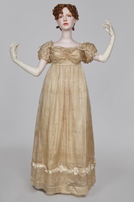 Lot 60 - A striped gold silk gauze ball gown, English, circa 1810