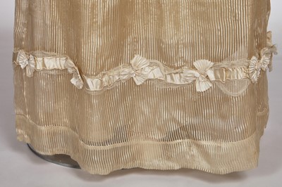 Lot 60 - A striped gold silk gauze ball gown, English, circa 1810