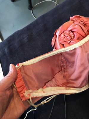 Lot 102 - A pink satin evening bodice with elaborate puff sleeves, English, circa 1815