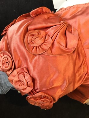 Lot 102 - A pink satin evening bodice with elaborate puff sleeves, English, circa 1815