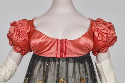Lot 102 - A pink satin evening bodice with elaborate puff sleeves, English, circa 1815