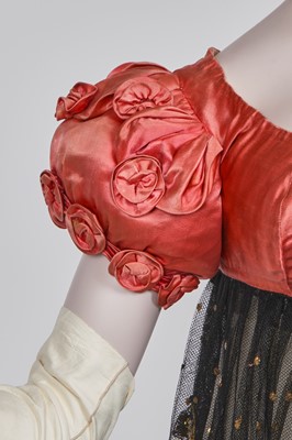 Lot 102 - A pink satin evening bodice with elaborate puff sleeves, English, circa 1815