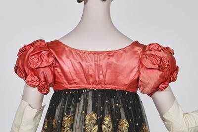 Lot 102 - A pink satin evening bodice with elaborate puff sleeves, English, circa 1815