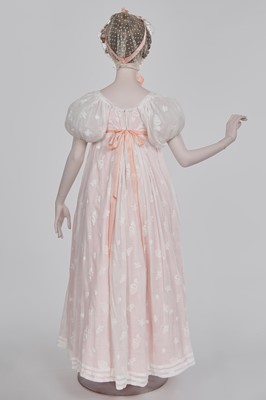 Lot 52 - A finely embroidered muslin evening dress, French, circa 1807