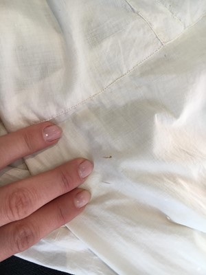 Lot 101 - A white percale morning coat, English, circa 1814