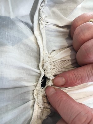 Lot 101 - A white percale morning coat, English, circa 1814