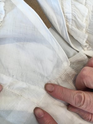 Lot 101 - A white percale morning coat, English, circa 1814