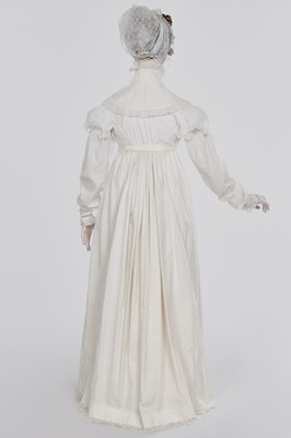 Lot 101 - A white percale morning coat, English, circa 1814