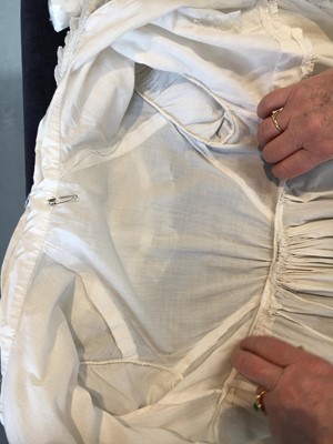 Lot 101 - A white percale morning coat, English, circa 1814
