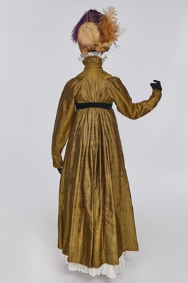 Lot 90 - A brown-green sarsanet redingote/pelisse, 1810-1815