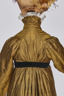 Lot 90 - A brown-green sarsanet redingote/pelisse, 1810-1815