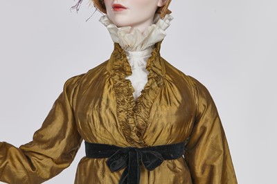 Lot 90 - A brown-green sarsanet redingote/pelisse, 1810-1815