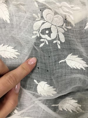Lot 77 - A figured sarsanet spencer and muslin petticoat, English, circa 1810-15