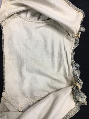 Lot 77 - A figured sarsanet spencer and muslin petticoat, English, circa 1810-15