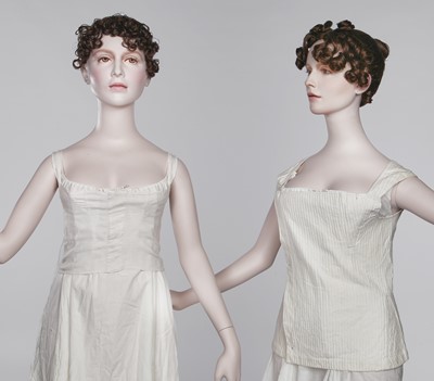 Lot 26 - A pair of girl's white linen short stays, probably French, circa 1805
