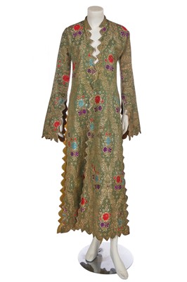 Lot 685 - A red, purple, blue and green brocaded Anteri robe, Ottoman Turkish, 1860s