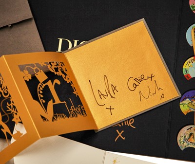 Lot 105 - A group of Christian Dior Holiday cards, fans, and other promotional materials