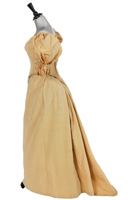 Lot 663 - A Marshall & Snelgrove yellow ribbed silk evening gown, circa 1895