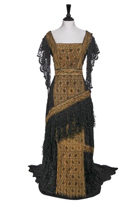 Lot 644 - A lamé and beaded evening dress, 1910-11