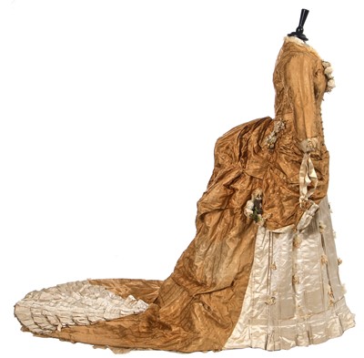 Lot 488 - An ecru silk bridal gown, American, circa 1885