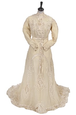 Lot 472 - A cream challis bridal gown, circa 1910