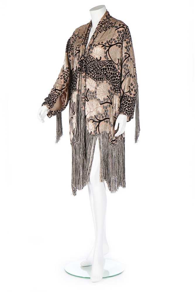 Lot 1 - A cut-velvet evening jacket, 1920s, in shades...