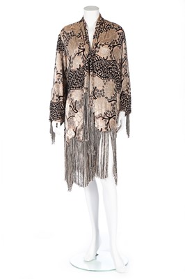 Lot 1 - A cut-velvet evening jacket, 1920s, in shades...