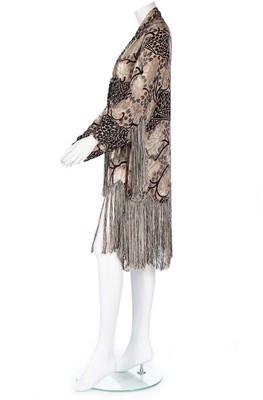 Lot 1 - A cut-velvet evening jacket, 1920s, in shades...