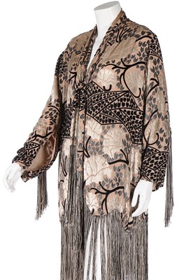 Lot 1 - A cut-velvet evening jacket, 1920s, in shades...
