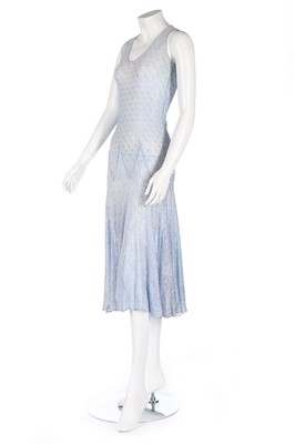 Lot 2 - A pink lamé evening jacket, early 1930s, with...
